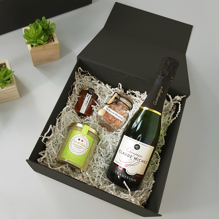Un coffret de remerciement, produit par The Creative Gift.